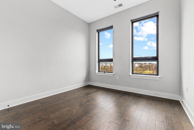 44691 Wellfleet Dr Unit 508, Ashburn, VA 20147 - empty room featuring dark wood-style flooring and baseboards