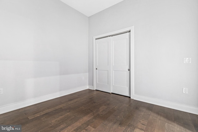 44691 Wellfleet Dr Unit 508, Ashburn, VA 20147 - spare room with dark wood-type flooring and baseboards