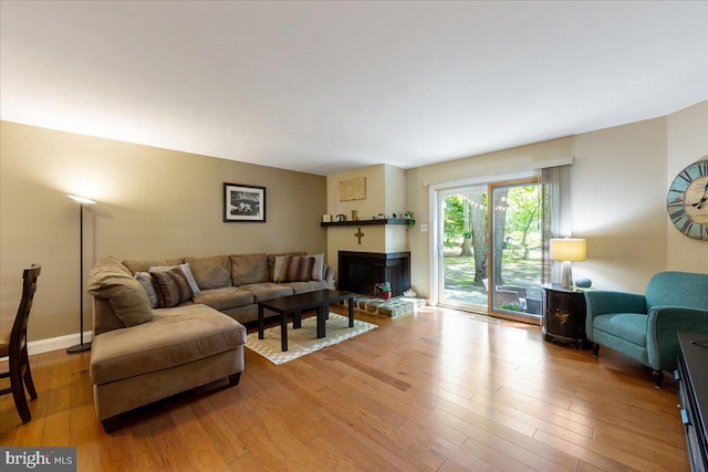 915 Burberry Ct, Sicklerville, NJ 08081 - living room featuring hardwood / wood-style floors and a fireplace with raised hearth