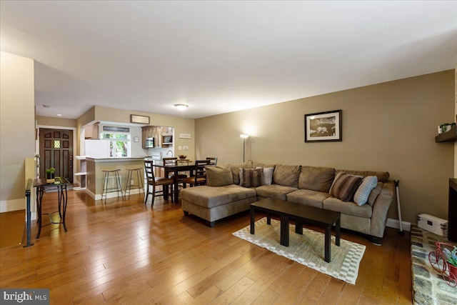 915 Burberry Ct, Sicklerville, NJ 08081 - living room with wood-type flooring and baseboards