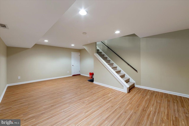 915 Burberry Ct, Sicklerville, NJ 08081 - finished below grade area featuring baseboards, stairs, light wood-type flooring, and recessed lighting