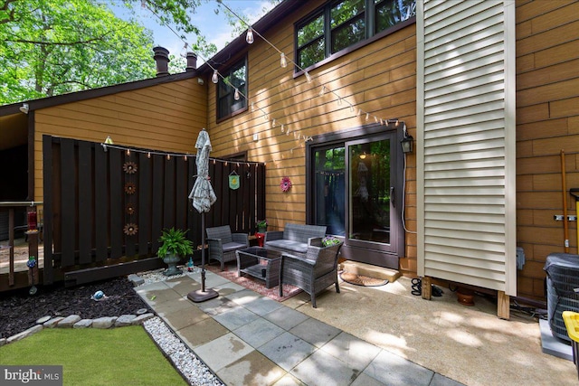915 Burberry Ct, Sicklerville, NJ 08081 - rear view of house featuring a patio area and an outdoor hangout area