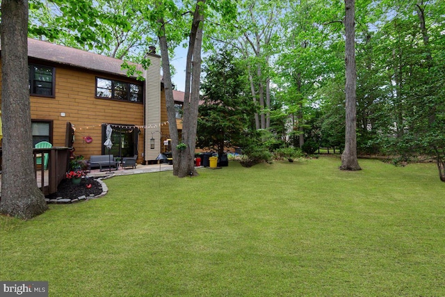 915 Burberry Ct, Sicklerville, NJ 08081 - view of green lawn with a patio area