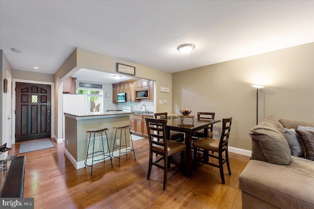 915 Burberry Ct, Sicklerville, NJ 08081 - dining room with light wood-type flooring, baseboards, and recessed lighting