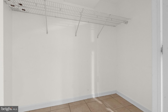 304 Moncure Dr, Alexandria, VA 22314 - walk in closet featuring light tile patterned floors