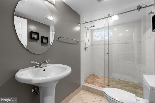 304 Moncure Dr, Alexandria, VA 22314 - bathroom with toilet, tile patterned flooring, and a shower stall