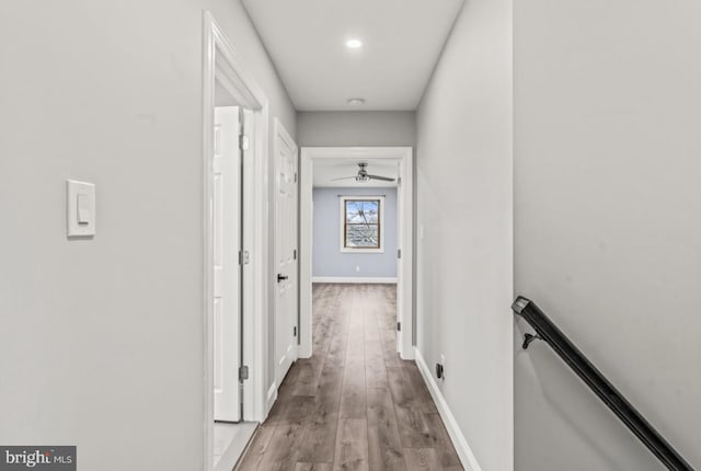 22 Duncan Ave, Westville, NJ 08093 - corridor featuring light wood-style floors, an upstairs landing, and baseboards