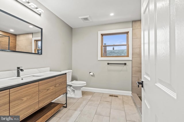 22 Duncan Ave, Westville, NJ 08093 - full bath with baseboards, vanity, toilet, tile patterned flooring, and recessed lighting