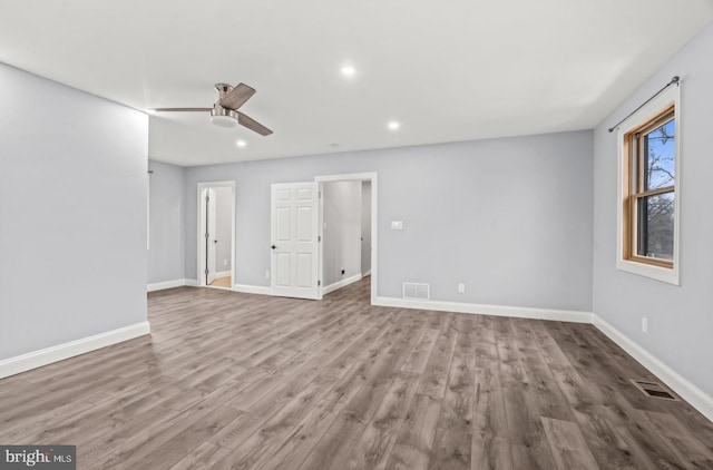 22 Duncan Ave, Westville, NJ 08093 - unfurnished living room featuring ceiling fan, wood finished floors, baseboards, and recessed lighting