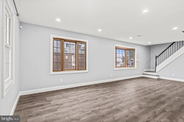 22 Duncan Ave, Westville, NJ 08093 - unfurnished living room featuring wood finished floors, recessed lighting, stairway, and baseboards