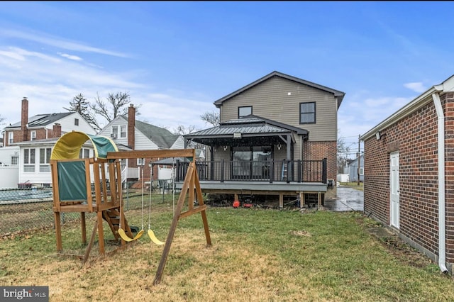 22 Duncan Ave, Westville, NJ 08093 - rear view of house with a playground, a gazebo, and brick siding