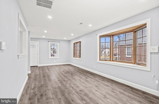22 Duncan Ave, Westville, NJ 08093 - unfurnished room featuring baseboards, wood finished floors, and recessed lighting