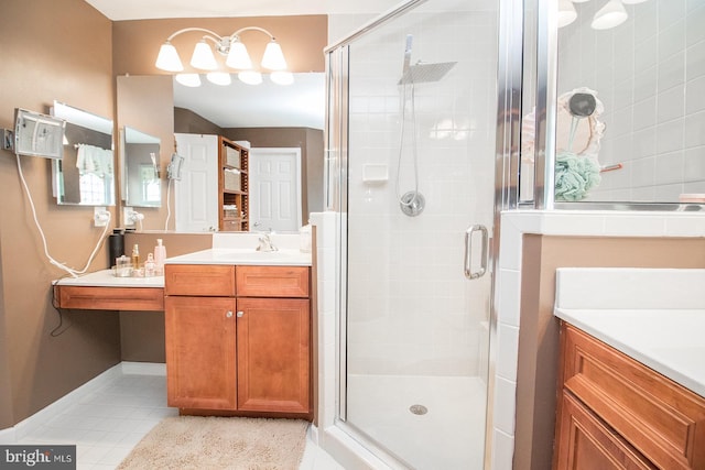 23371 Hosta Ln, California, MD 20619 - bathroom with tile patterned flooring, a stall shower, vanity, and a chandelier