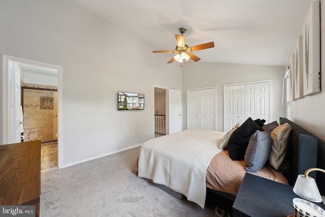 bedroom featuring multiple closets, carpet flooring, baseboards, connected bathroom, and a ceiling fan