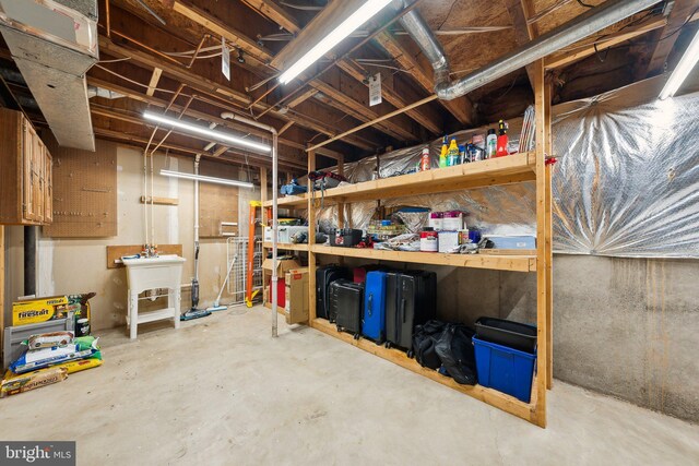 storage room with a sink