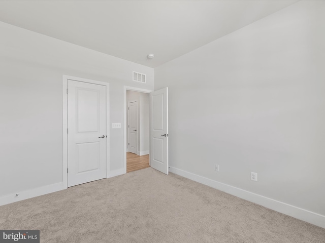 35015 Kindleton Ln, Lewes, DE 19958 - spare room featuring carpet flooring and baseboards