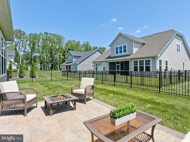 35015 Kindleton Ln, Lewes, DE 19958 - view of patio with an outdoor living space with a fire pit