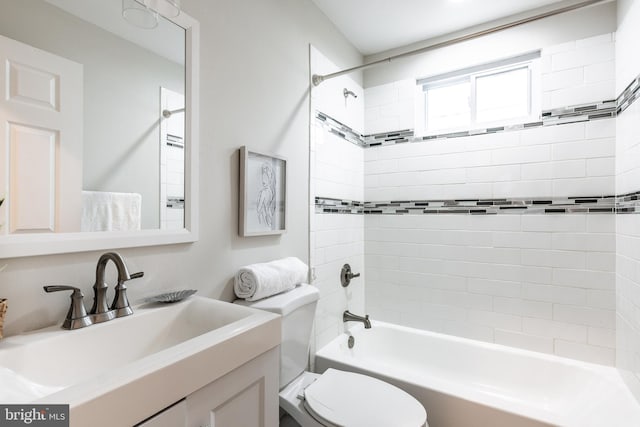 1020 Thomas Rd, Glen Burnie, MD 21060 - bathroom featuring vanity, toilet, and bathing tub / shower combination