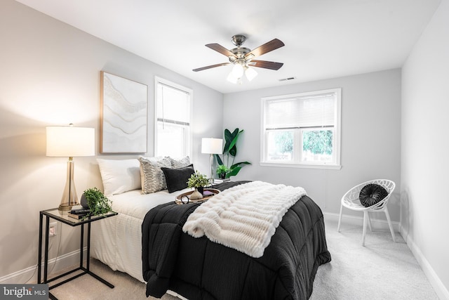 1020 Thomas Rd, Glen Burnie, MD 21060 - bedroom with baseboards, light colored carpet, and a ceiling fan