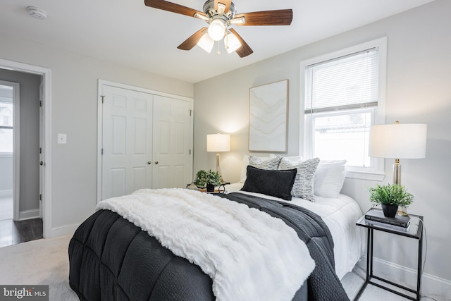 1020 Thomas Rd, Glen Burnie, MD 21060 - bedroom with a closet, baseboards, a ceiling fan, and carpet