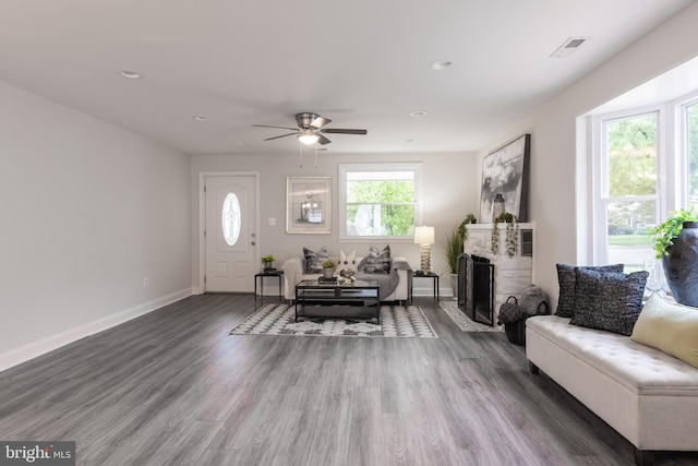 1020 Thomas Rd, Glen Burnie, MD 21060 - living area featuring ceiling fan, wood finished floors, a fireplace, baseboards, and recessed lighting