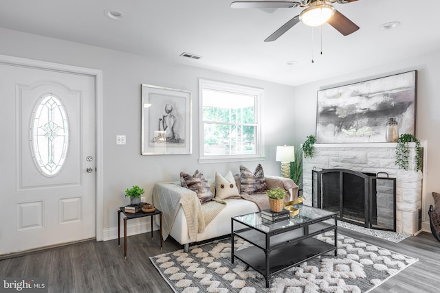 1020 Thomas Rd, Glen Burnie, MD 21060 - living area featuring wood finished floors, a stone fireplace, a ceiling fan, recessed lighting, and baseboards