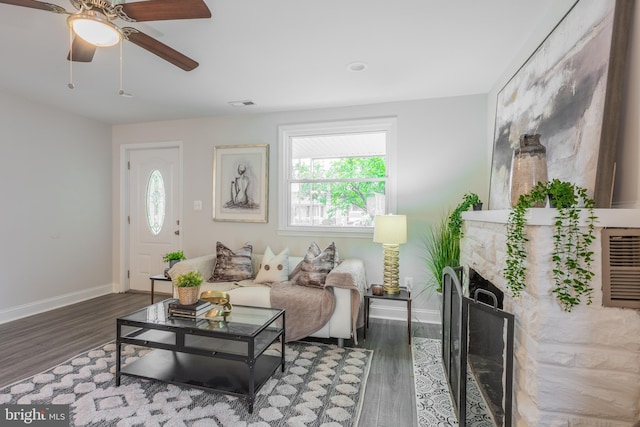 1020 Thomas Rd, Glen Burnie, MD 21060 - living area featuring wood finished floors, baseboards, and a fireplace