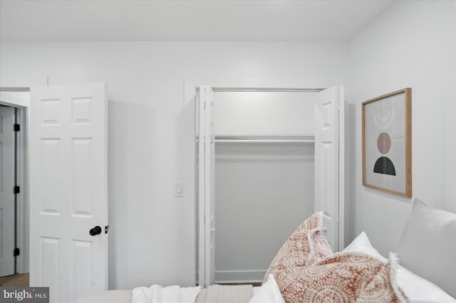 8224 Old Mill Rd, Pasadena, MD 21122 - bedroom with a closet and wood finished floors
