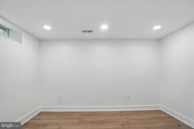 8224 Old Mill Rd, Pasadena, MD 21122 - basement featuring baseboards, light wood-type flooring, and recessed lighting