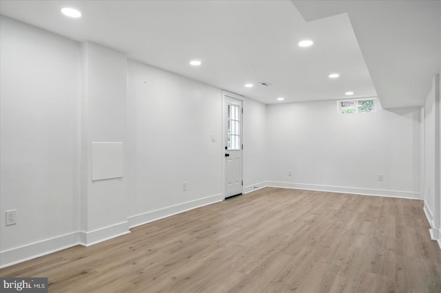 8224 Old Mill Rd, Pasadena, MD 21122 - below grade area featuring light wood-style flooring, recessed lighting, and baseboards