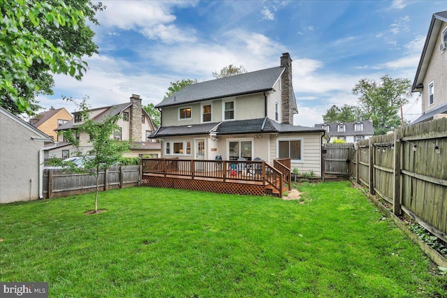628 Mason Ave, Drexel Hill, PA 19026 - back of property with a deck and a chimney