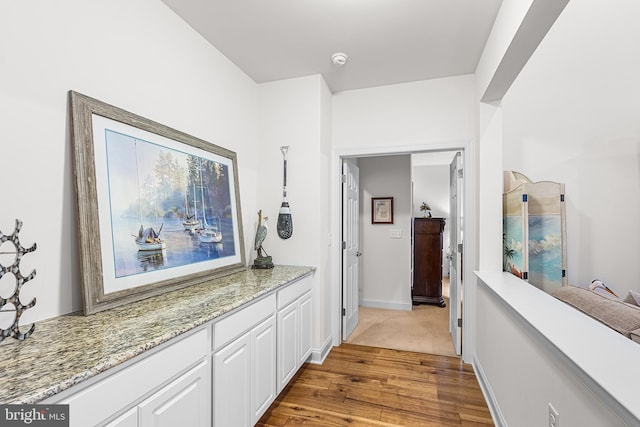 606 Garden Gate Dr, Middletown, DE 19709 - corridor with light wood finished floors
