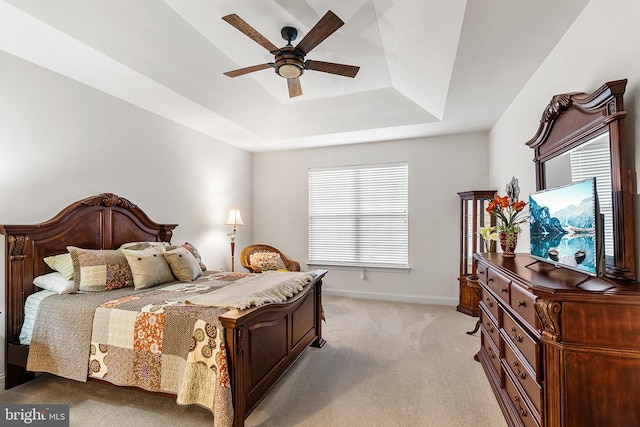 606 Garden Gate Dr, Middletown, DE 19709 - bedroom featuring light carpet, a raised ceiling, baseboards, and a ceiling fan