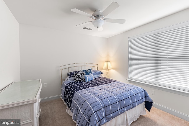 606 Garden Gate Dr, Middletown, DE 19709 - carpeted bedroom with baseboards and ceiling fan