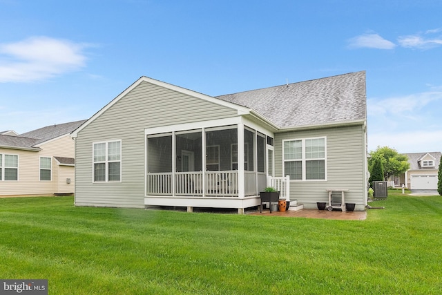 606 Garden Gate Dr, Middletown, DE 19709 - back of house with a sunroom, cooling unit, a yard, and a shingled roof