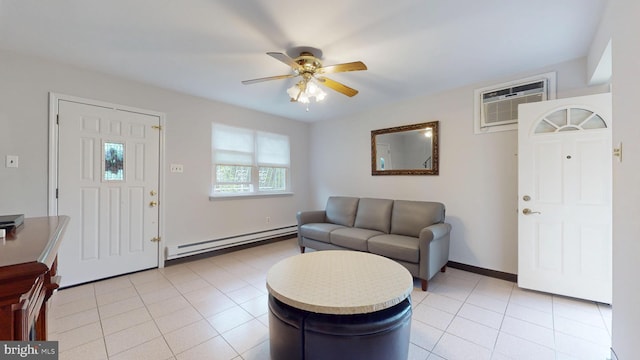 entryway featuring baseboard heating, a wall unit AC, baseboards, ceiling fan, and light tile patterned flooring