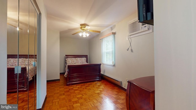 bedroom with ceiling fan, an AC wall unit, baseboards, and a baseboard heating unit