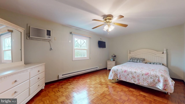 bedroom featuring a baseboard heating unit, ceiling fan, and an AC wall unit