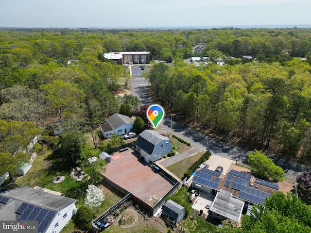 aerial view featuring a view of trees