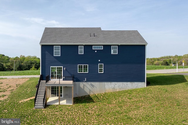 502 Winding Way Asbury Ii Model, Unit Asbury Ii Model, Wrightsville, PA 17368 - rear view of house with stairway, a deck, a patio area, and roof with shingles