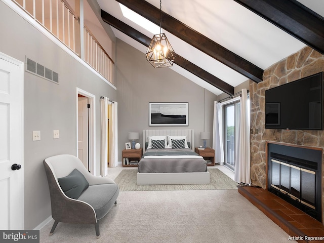 carpeted bedroom with beam ceiling, a chandelier, a fireplace, access to outside, and high vaulted ceiling
