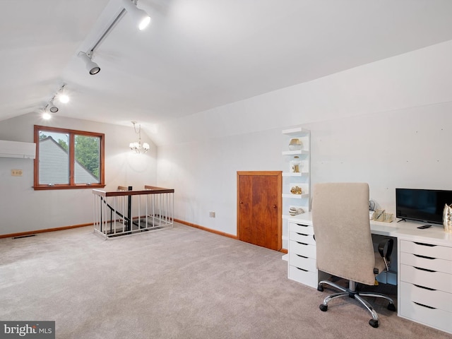 office with track lighting, vaulted ceiling, carpet floors, and baseboards