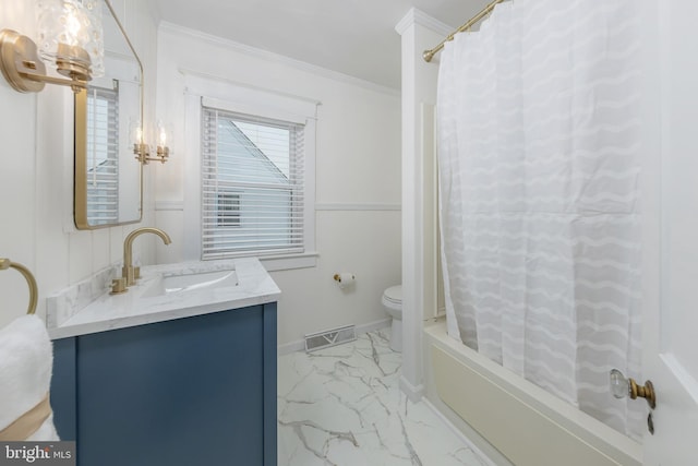 full bathroom featuring marble finish floors, toilet, vanity, shower / bath combo with shower curtain, and ornamental molding