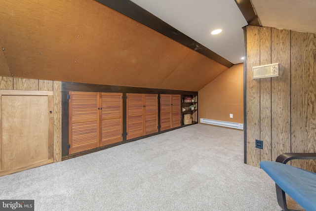 bonus room with lofted ceiling, wood walls, a baseboard heating unit, and carpet floors