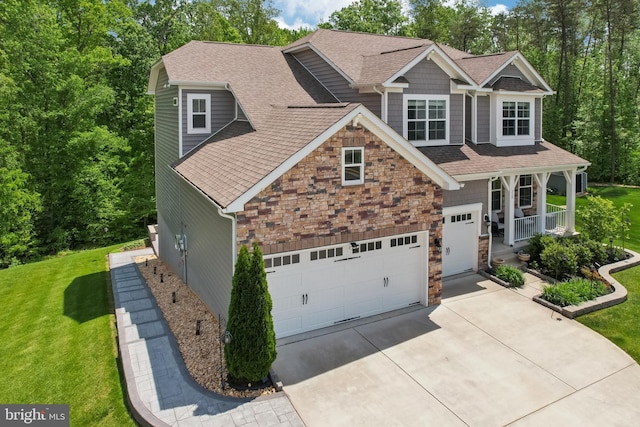 craftsman house featuring concrete driveway, stone siding, roof with shingles, and a front lawn