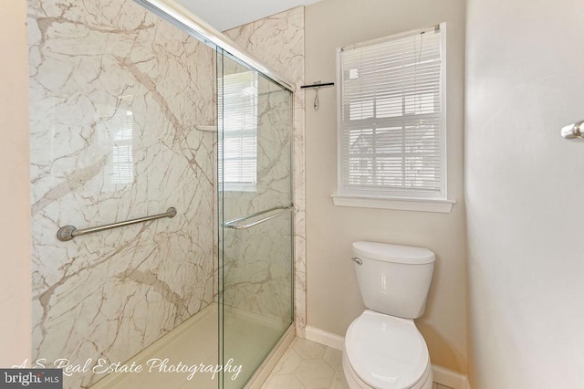 1007 Whispering Ponds Ct, Salisbury, MD 21804 - full bath featuring a marble finish shower, toilet, baseboards, and tile patterned floors