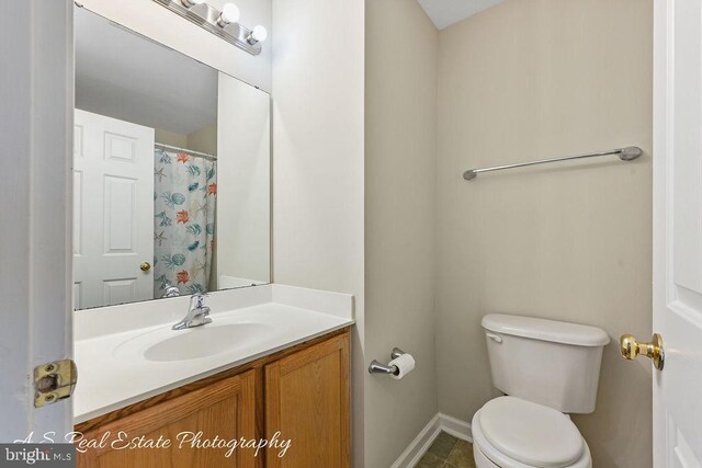 1007 Whispering Ponds Ct, Salisbury, MD 21804 - full bath with baseboards, toilet, and vanity