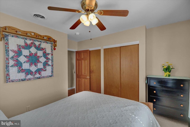 bedroom with a ceiling fan and visible vents