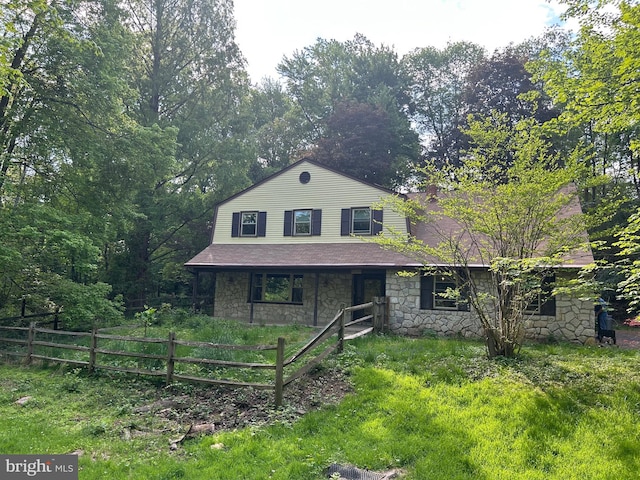 1535 Fieldwood Rd, Southampton, PA 18966 - view of front of house featuring stone siding, fence, and covered porch