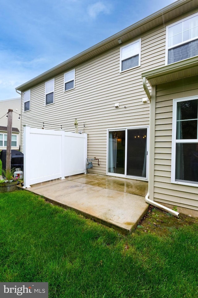rear view of house with a patio area